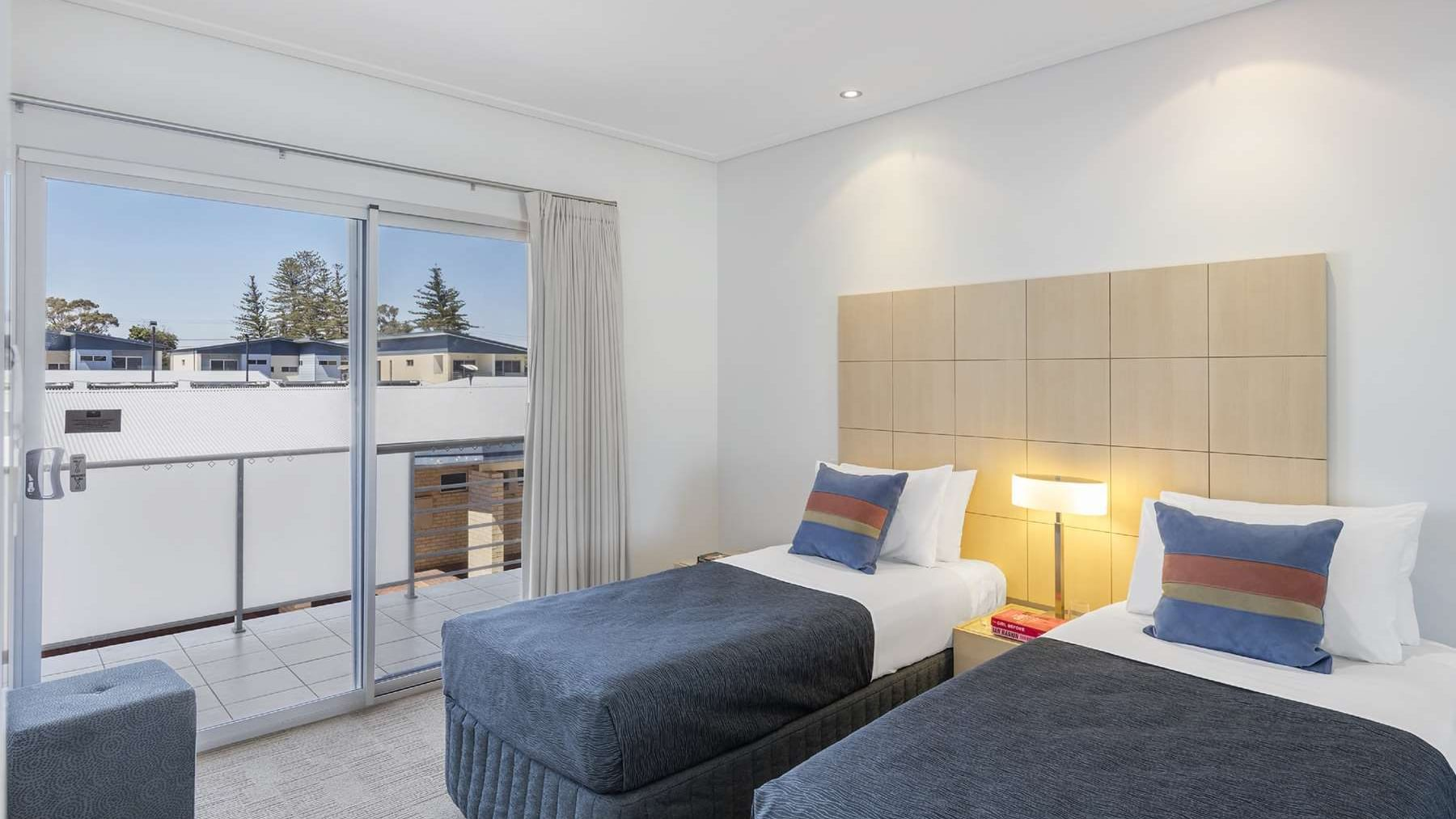 Shared twin-bed room in the Geraldton apartments